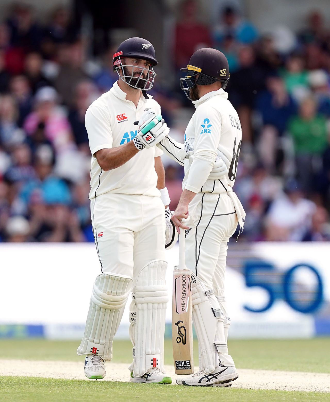 Daryl Mitchell celebrates with Tom Blundell after reaching his half-century, England vs New Zealand, 3rd Test, Headingley, 4th day, June 26, 2022