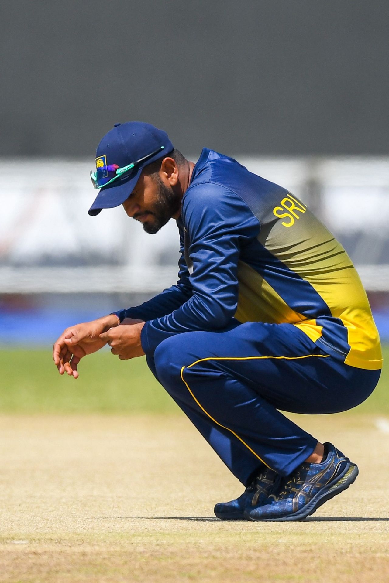 Dimuth Karunaratne takes a close look at the Galle pitch, Galle, June 28, 2022