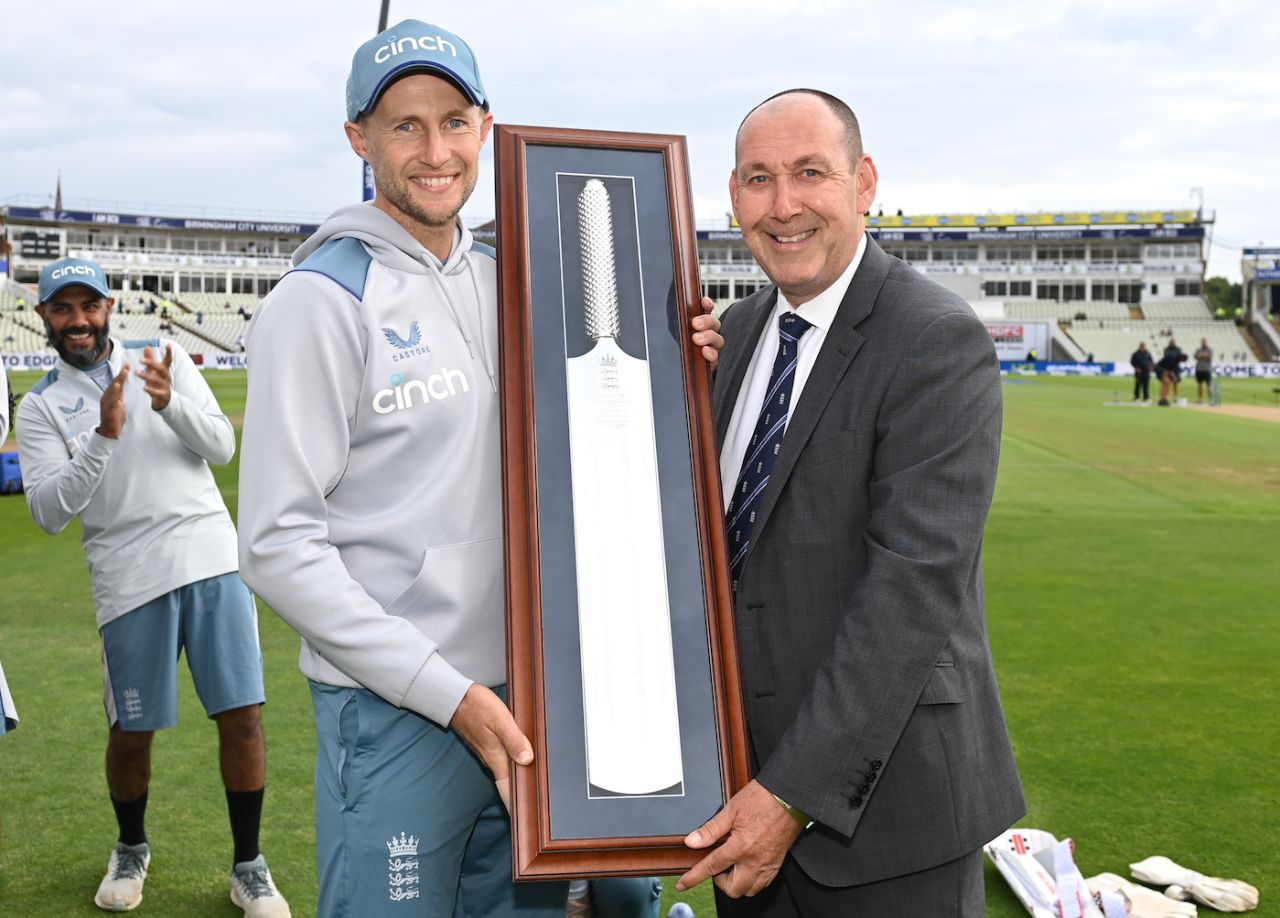 Joe Root is presented with a silver bat by Martin Darlow (ECB board - interim chair and cricket non-executive director) to commemorate his 10,000 Test runs, England vs India, 5th Test, Birmingham, 1st day, July 1, 2022