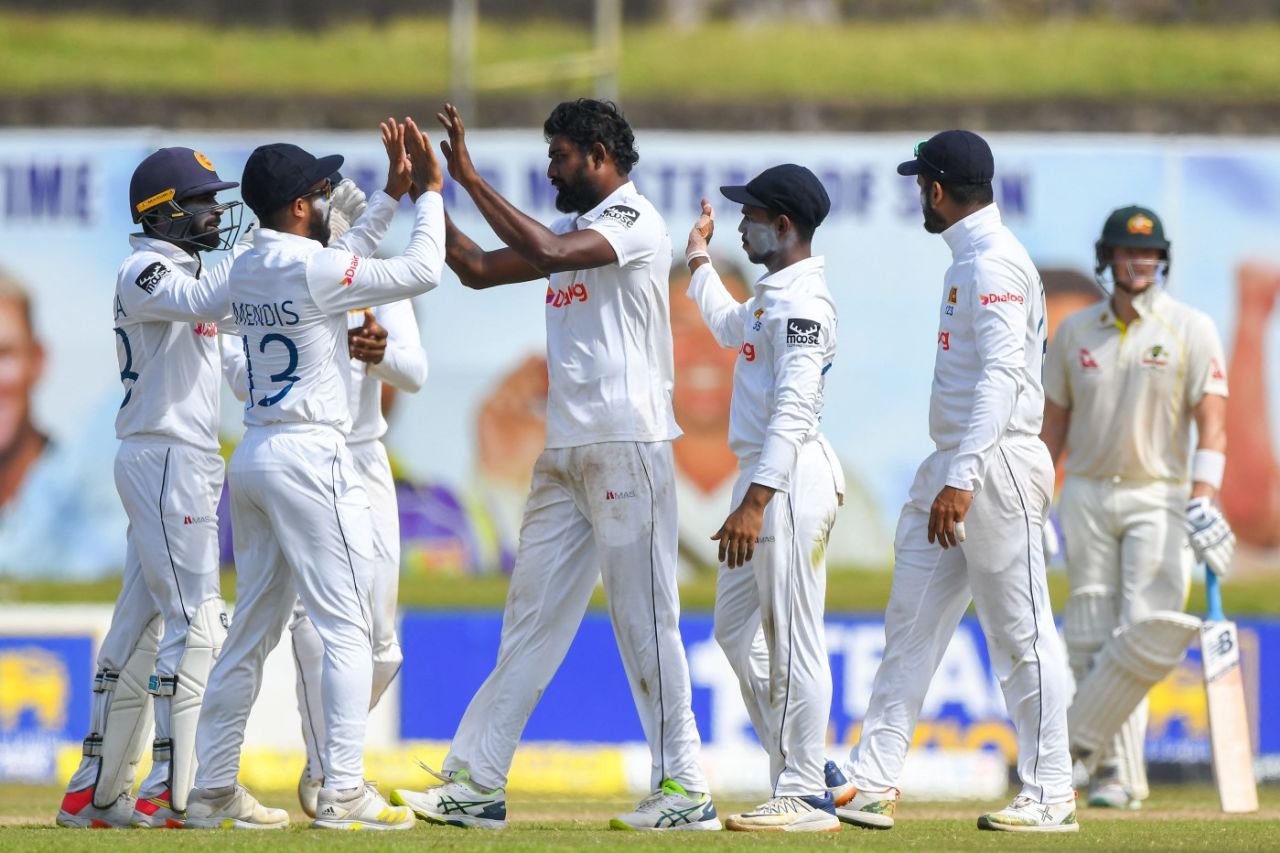 Prabath Jayasuriya (centre) is congratulated on his first Test wicket, Sri Lanka vs Australia, 2nd Test, Galle, July 8, 2022