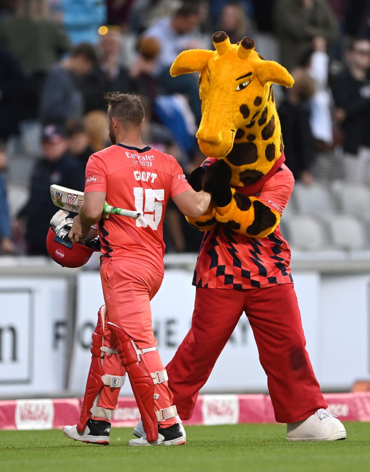 Steven Croft is congratulated by Lanky the Giraffe after securing Lancashire's Finals Day berth, Lancashire vs Essex, Vitality Blast, Old Trafford, July 8, 2022