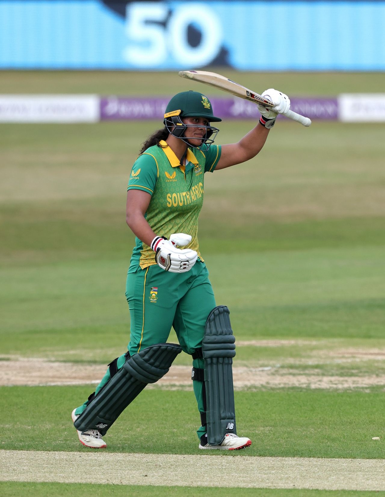Chloe Tryon raises her bat after her half-century, England vs South Africa, 1st women's ODI, Nottingham, July 11, 2022