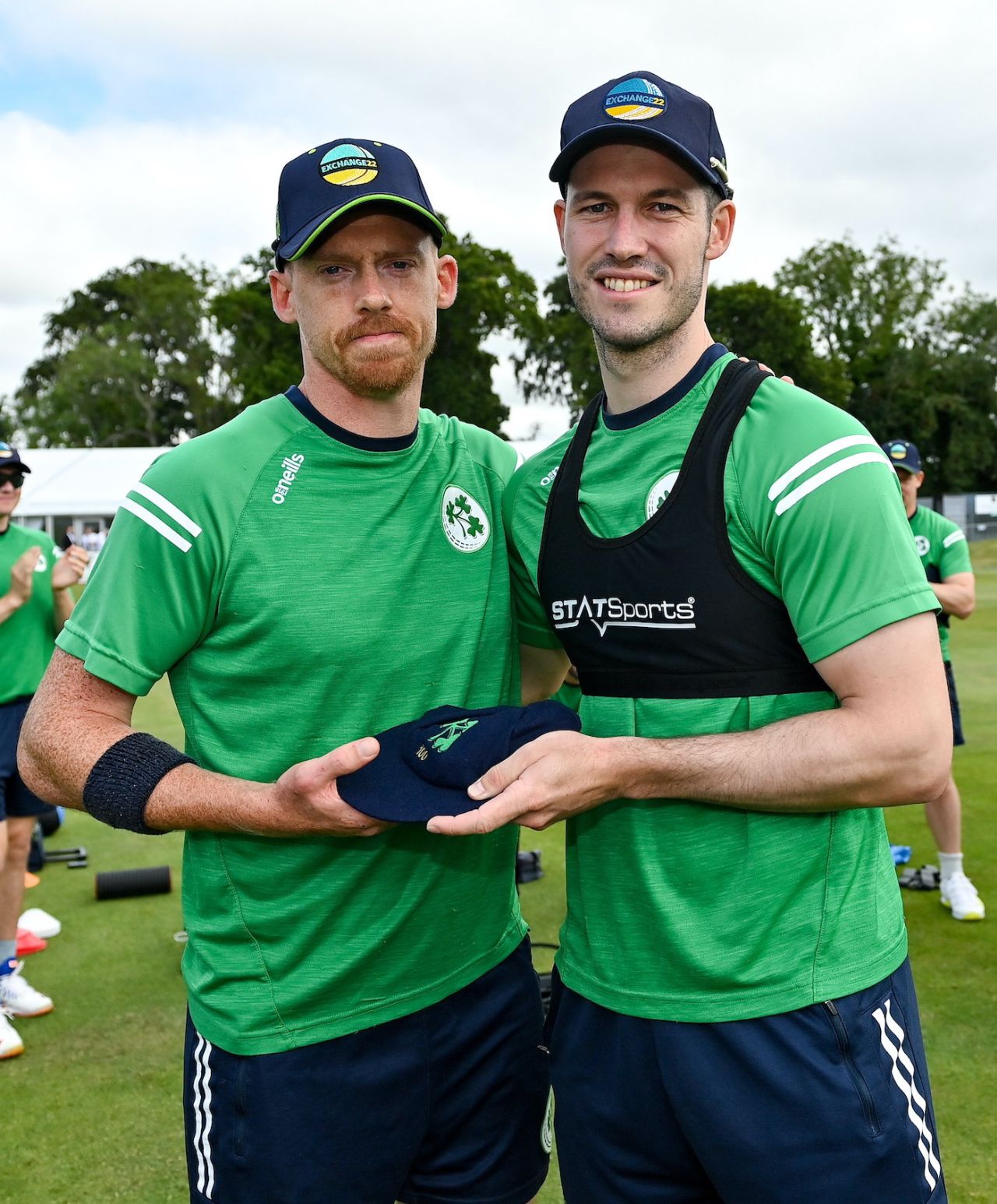 Craig Young is presented with his 100th cap by team-mate George Dockrell, Ireland vs New Zealand, 3rd ODI, Dublin, July 15, 2022
