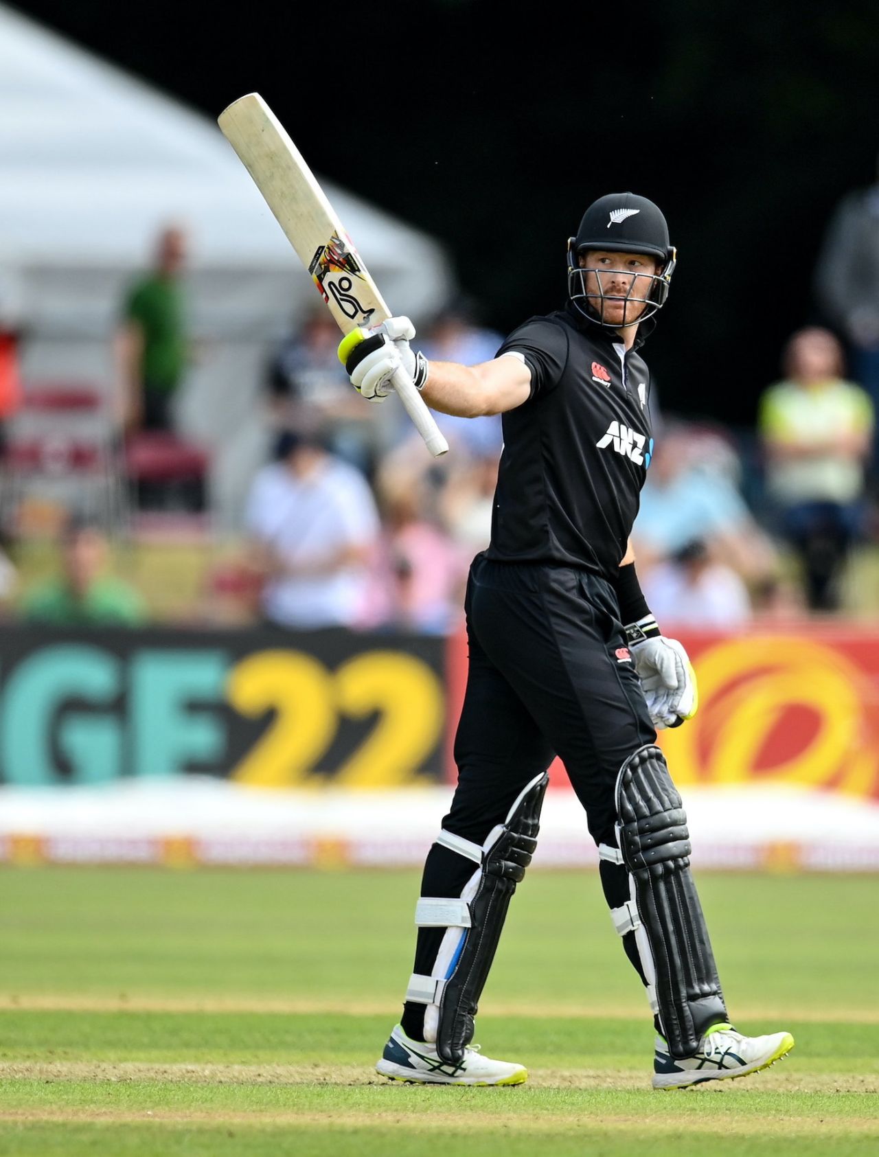 Martin Guptill raises his bat after getting to a half-century, Ireland vs New Zealand, 3rd ODI, Dublin, July 15, 2022