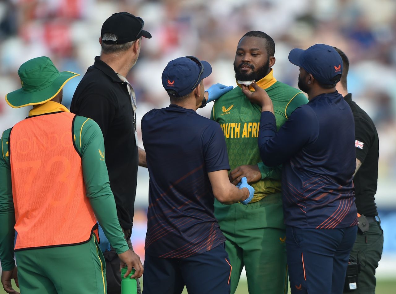 Andile Phehlukwayo gets medical attention after bruising his chin due to a collision with Keshav Maharaj, England vs South Africa, 1st ODI, Chester-le-Street, July 19, 2022
