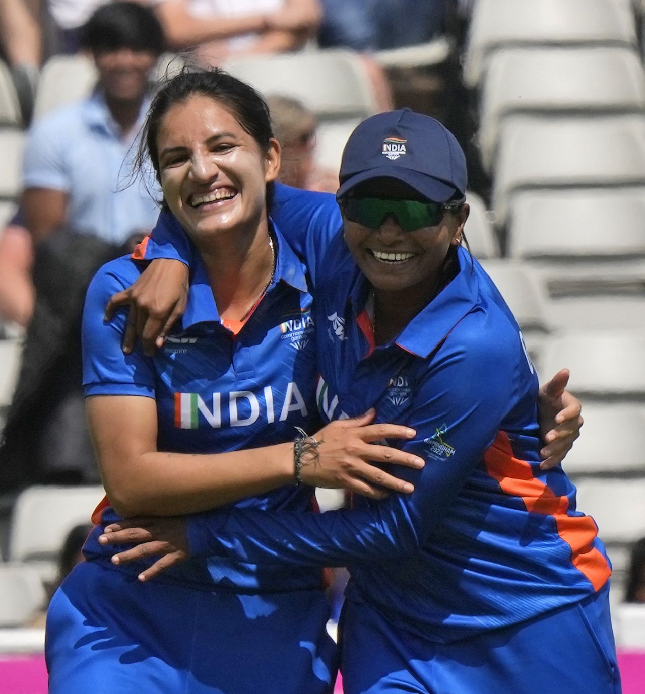 Renuka Singh Thakur (L) celebrates after dismissing Tahlia McGrath, one of her four wickets in the powerplay, Australia vs India, Commonwealth Games, Birmingham, July 29, 2022
