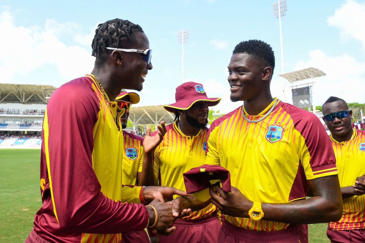 Alzarri Joseph receives his maiden T20I cap from Domnic Drakes, West Indies vs India, 1st T20I, Tarouba, July 29, 2022
