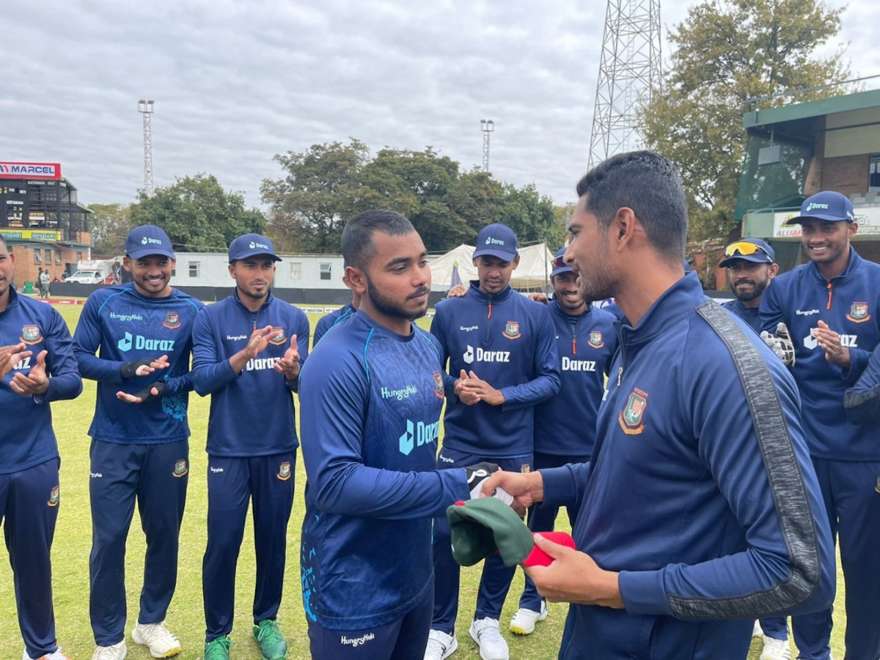 Mahmudullah hands over the T20I cap to Parvez Hossain Emon, Zimbabwe vs Bangladesh, 3rd T20I, Harare, August 2, 2022