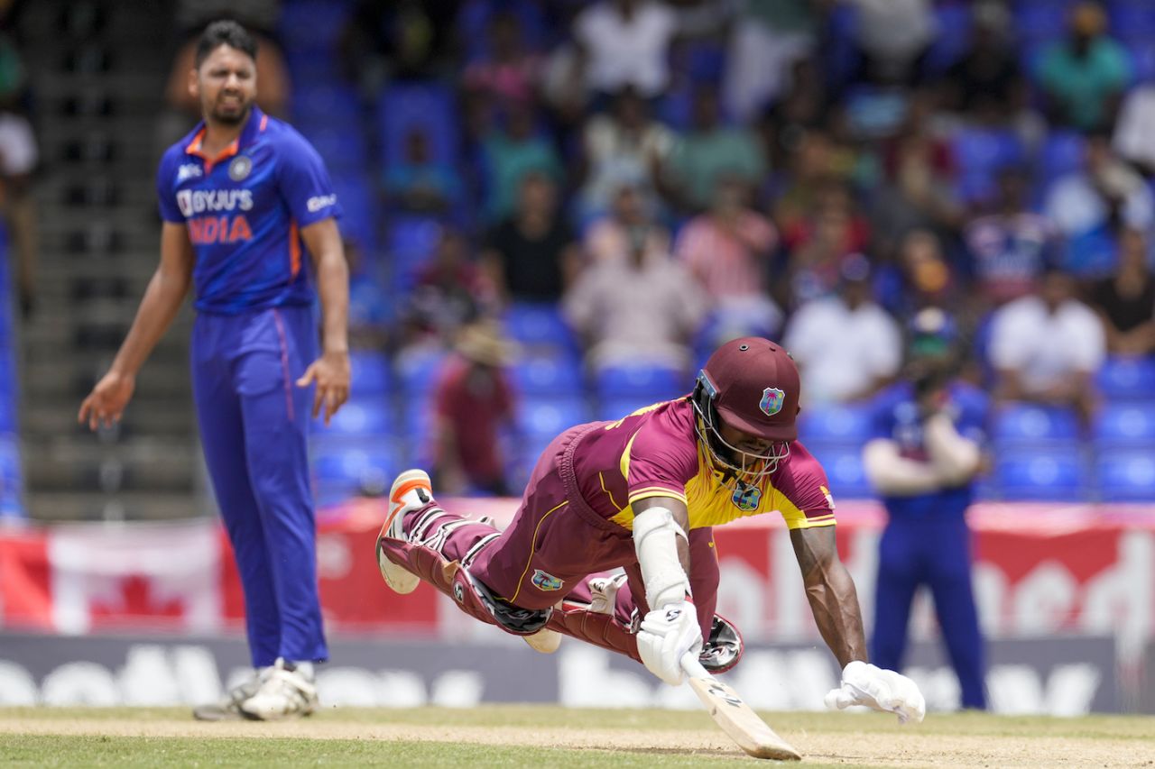 Kyle Mayers dives to make his ground as Avesh Khan looks on, West Indies vs India, 3rd T20I, Basseterre, August 2, 2022