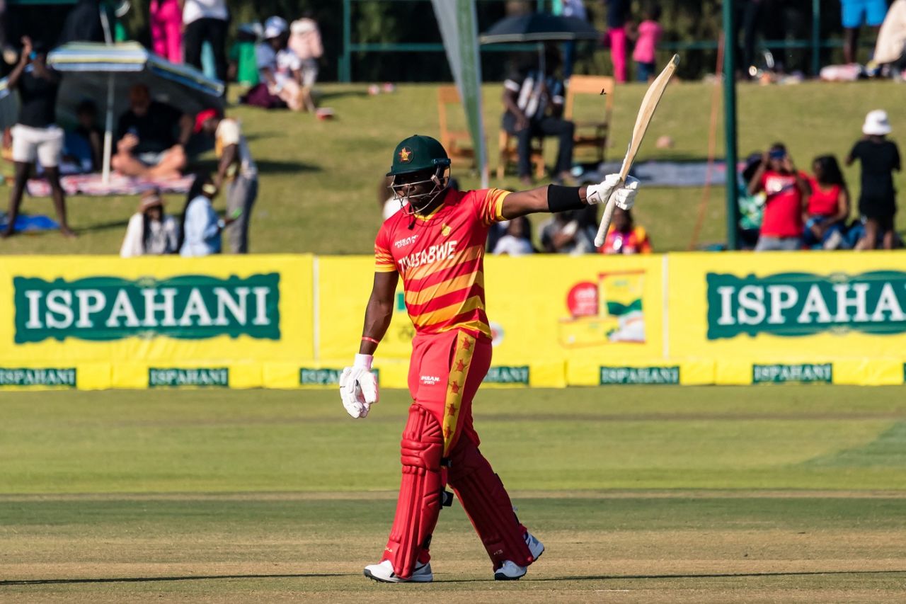 Innocent Kaia raises his bat after his half-century, Zimbabwe vs Bangladesh, 1st ODI, Harare, August 5, 2022