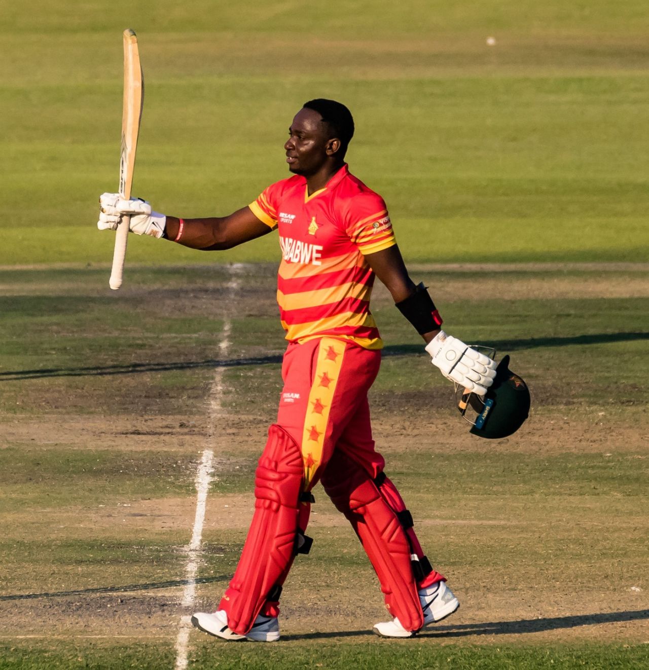 Innocent Kaia celebrates his maiden ODI hundred, Zimbabwe vs Bangladesh, 1st ODI, Harare, August 5, 2022