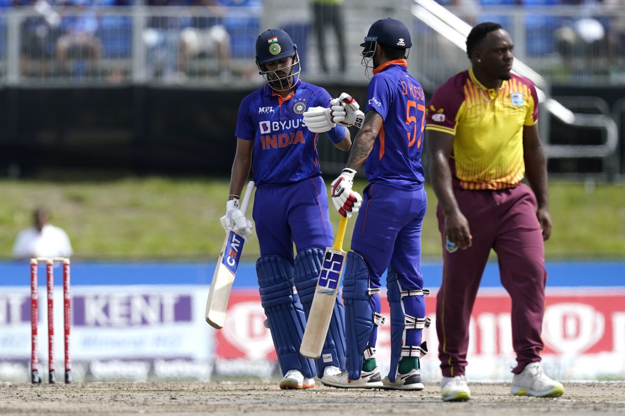Shreyas Iyer and Deepak Hooda have a glove-punch during their 76-run stand while Odean Smith walks back, West Indies vs India, 5th T20I, Lauderhill, August 7, 2022
