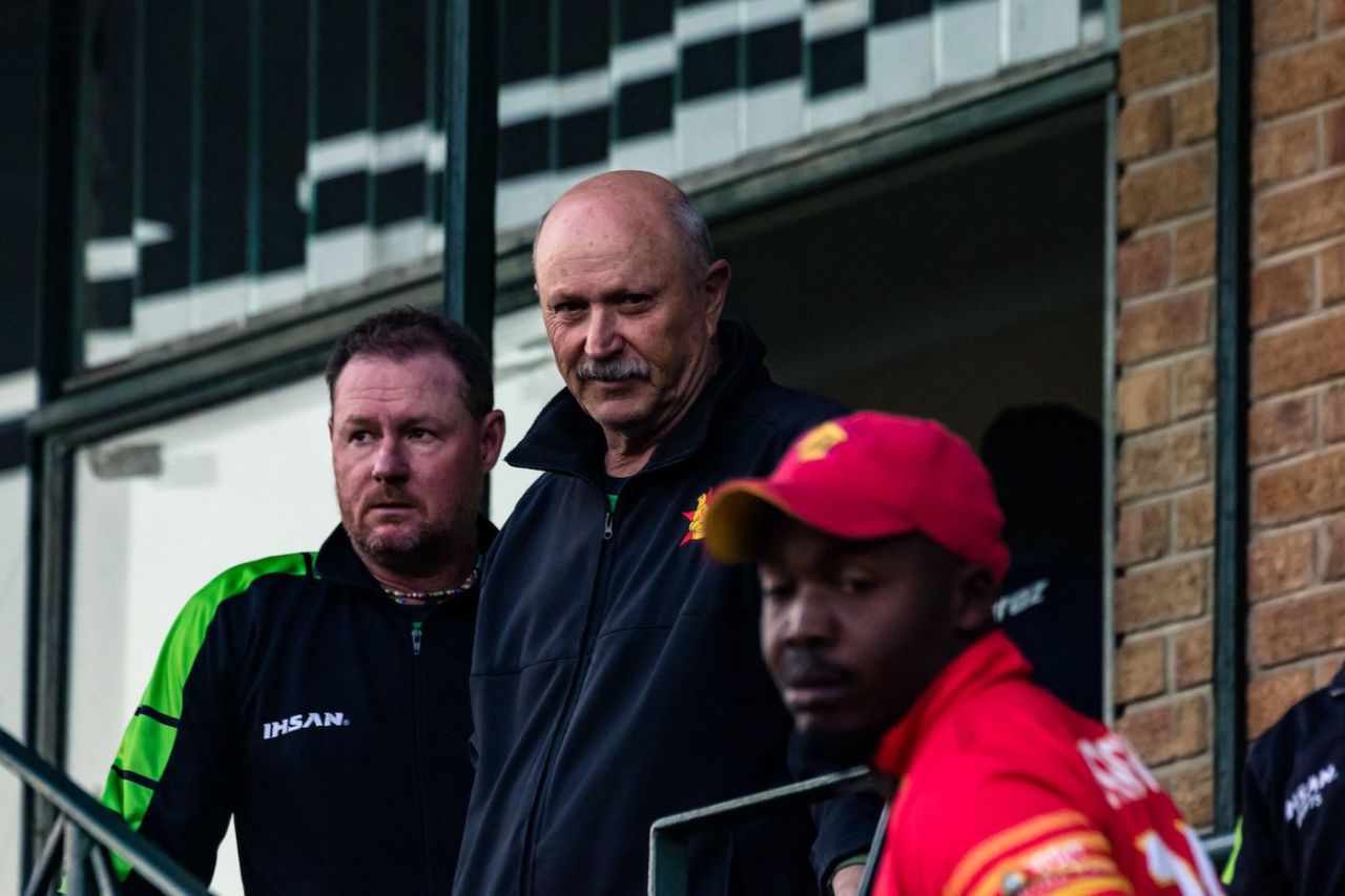 Zimbabwe head coach Dave Houghton and batting coach Lance Klusener watch proceedings after his team's series-sealing chase, Zimbabwe vs Bangladesh, 2nd ODI, Harare, August 7, 2022