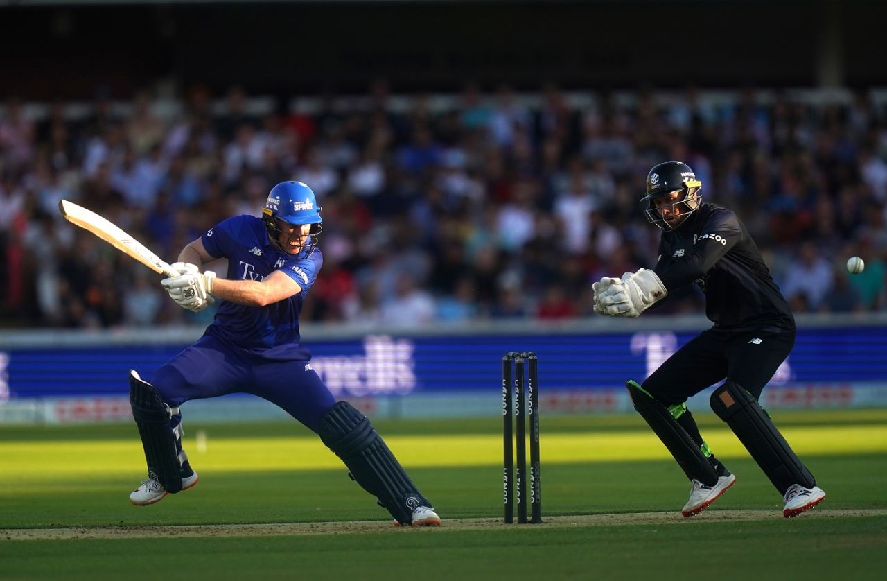 Batting in fading sunshine, Eoin Morgan slashes at the ball, London Spirit vs Manchester Originals, Men's Hundred, Lord's, August 8, 2022