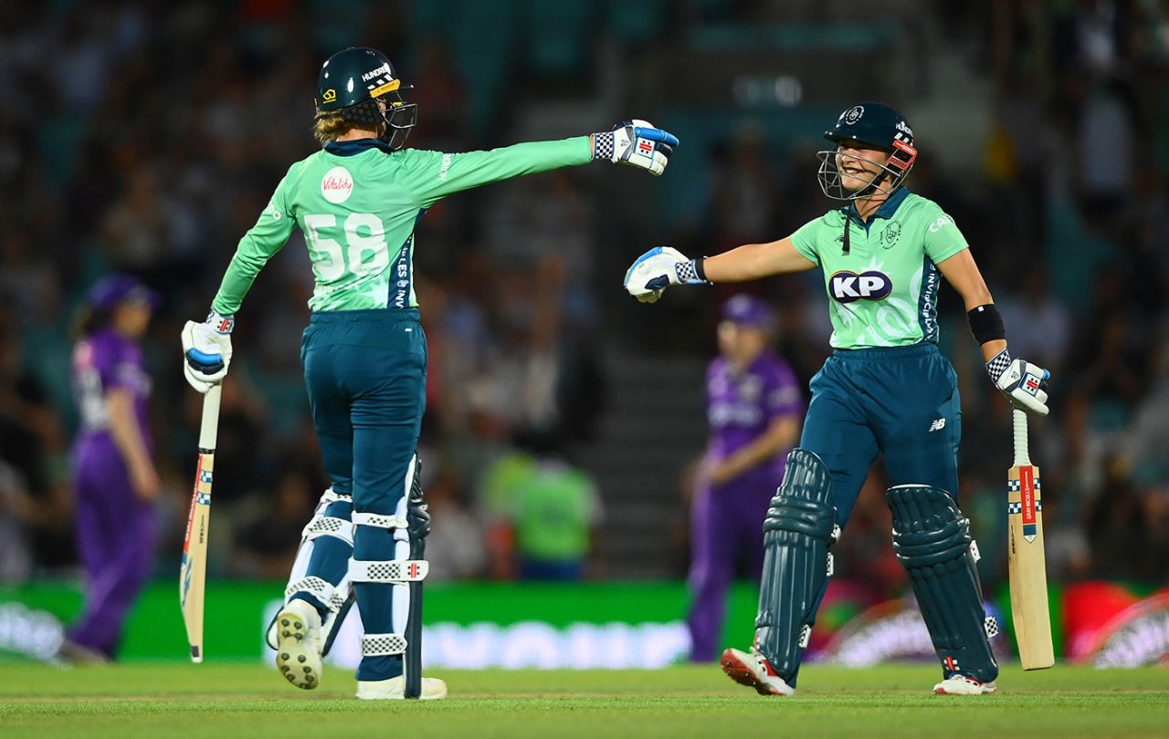 Lauren Winfield-Hill and Alice Capsey celebrating after completing victory, Oval Invincibles vs Northern Superchargers, Women's Hundred, Kia Oval, August 11, 2022