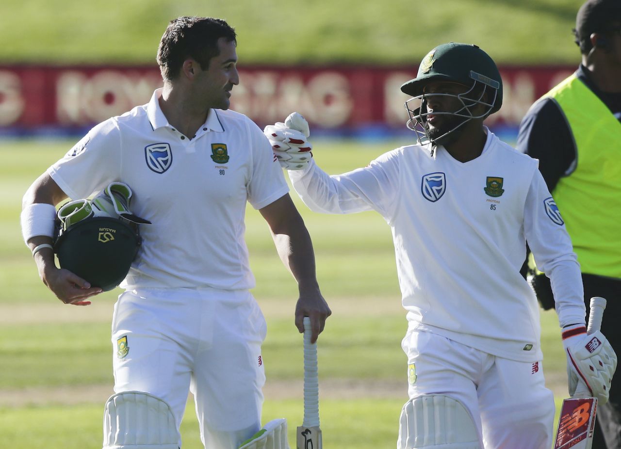 Temba Bavuma congratulates Dean Elgar on his unbeaten 128 as they leave the field, New Zealand v South Africa, 1st Test, Dunedin, 1st day, March 8, 2017