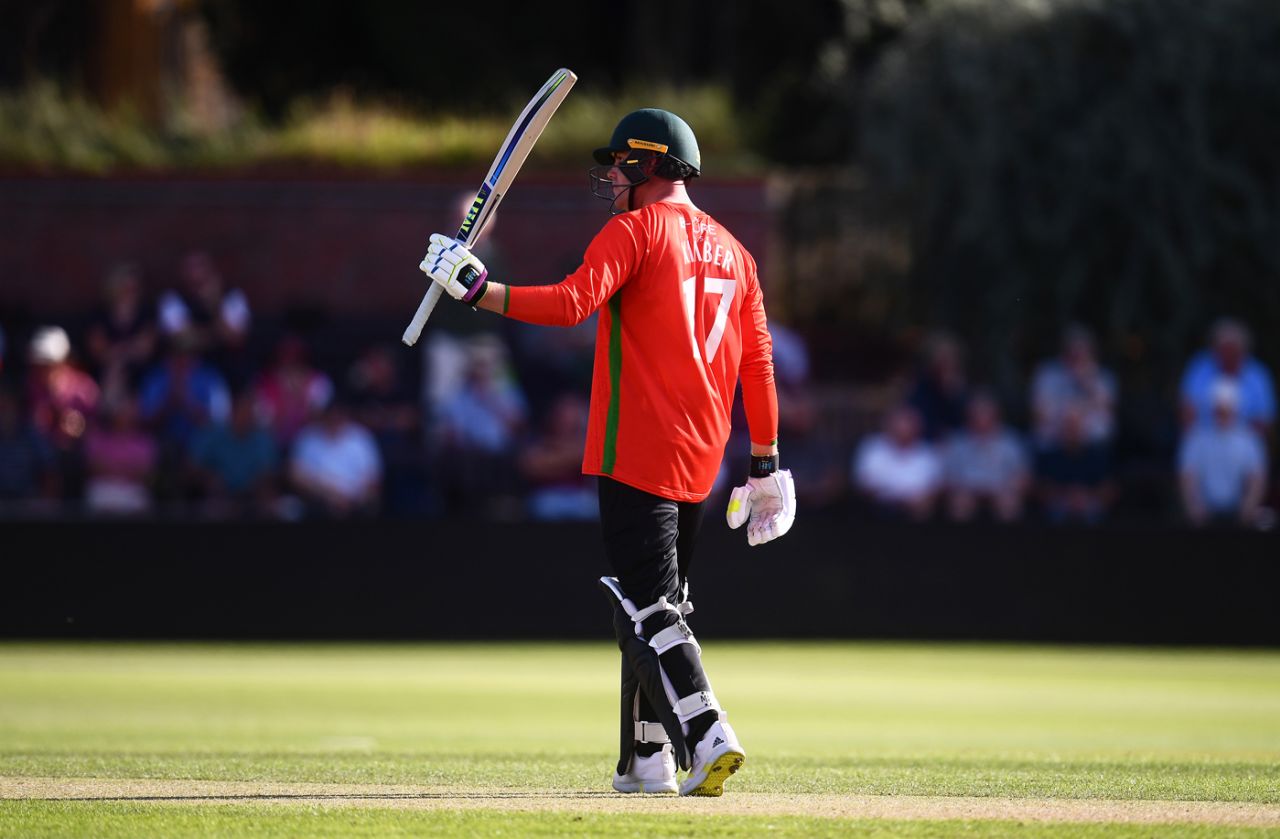 Louis Kimber of Leicestershire celebrates their half century during the Royal London One Day Cup match between Somerset and Leicestershire at The Cooper Associates County Ground on August 10, 2021 in Taunton