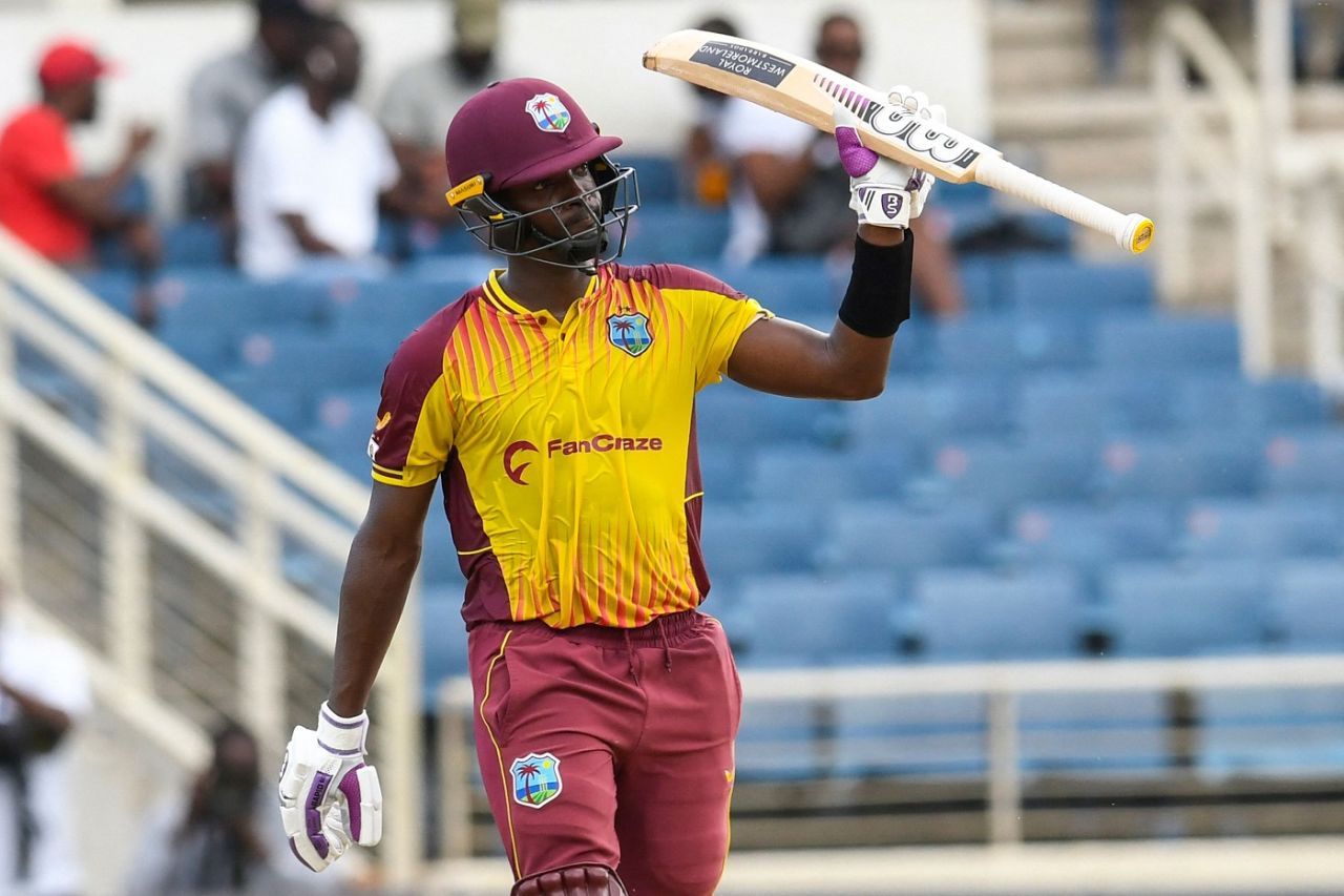 Shamarh Brooks raises his bat after reaching his maiden fifty in T20Is, West Indies v New Zealand, 3rd T20I, Kingston, August 14, 2022
