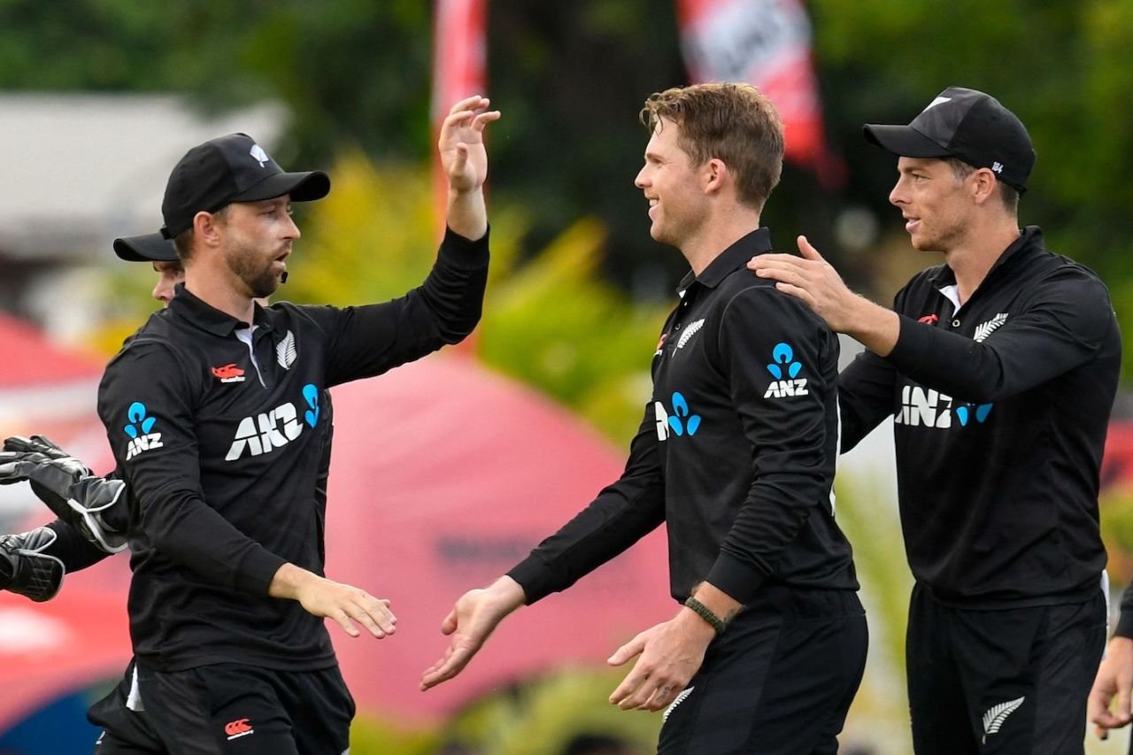 Lockie Ferguson is congratulated by Mitchell Santner and Devon Conway upon Kyle Mayers' wicket, West Indies vs New Zealand, 3rd ODI, Bridgetown, August 21, 2022