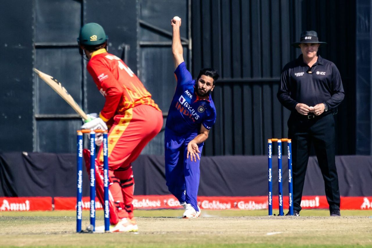 Shardul Thakur bowls to Sean Williams, with umpire Adrian Holdstock overseeing, Zimbabwe vs India, 3rd ODI, Harare, August 22, 2022