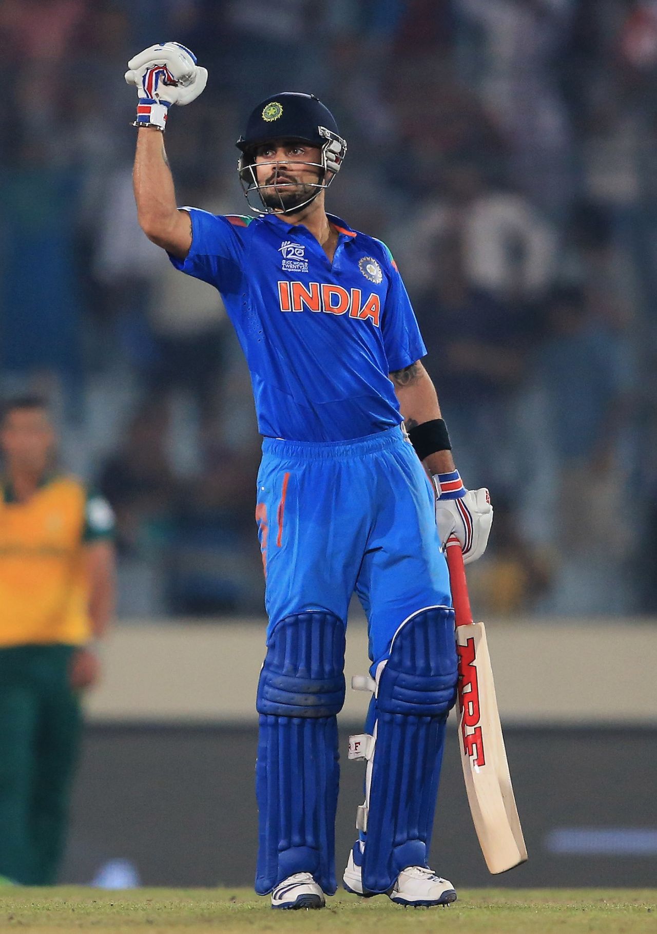Virat Kohli celebrates after hitting the winning runs, Dhaka, April 4, 2014