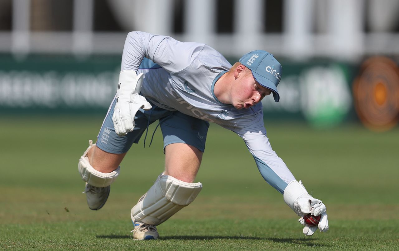 James Rew stoops for a catch in training, Derby, August 27, 2022