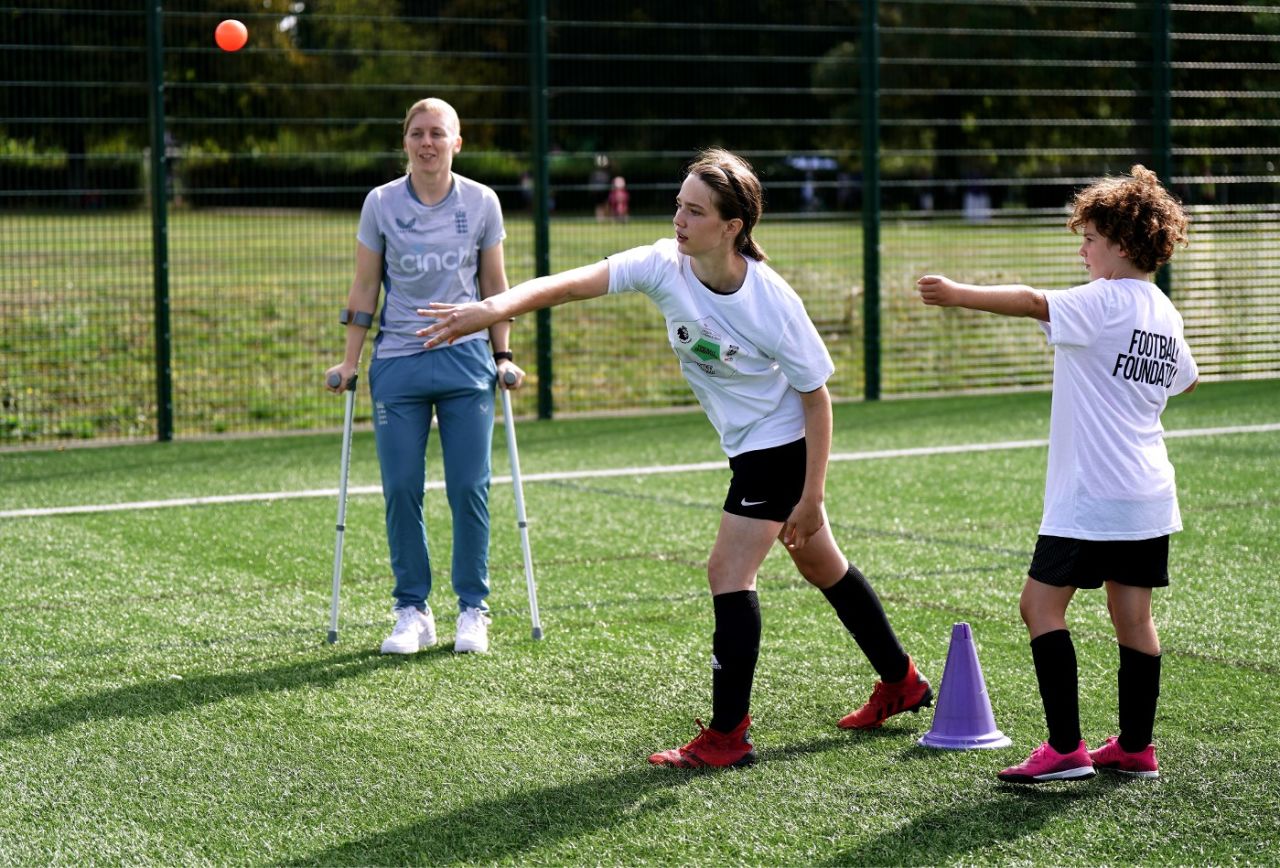 Heather Knight attends a Football Foundation event on crutches after recent hip surgery, August 24, 2022