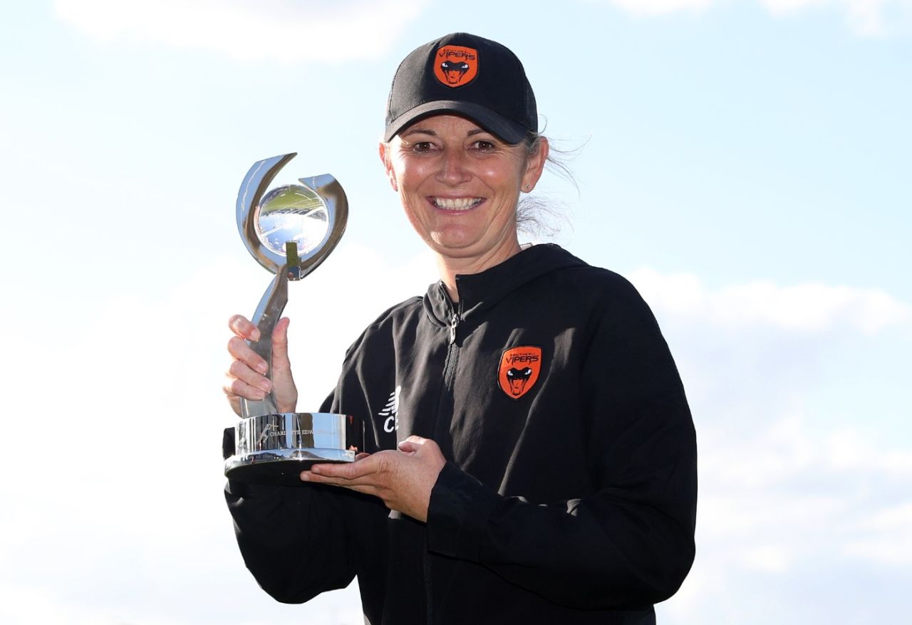 Charlotte Edwards poses with the trophy bearing her own name after Southern Vipers' victory, June 11, 2022