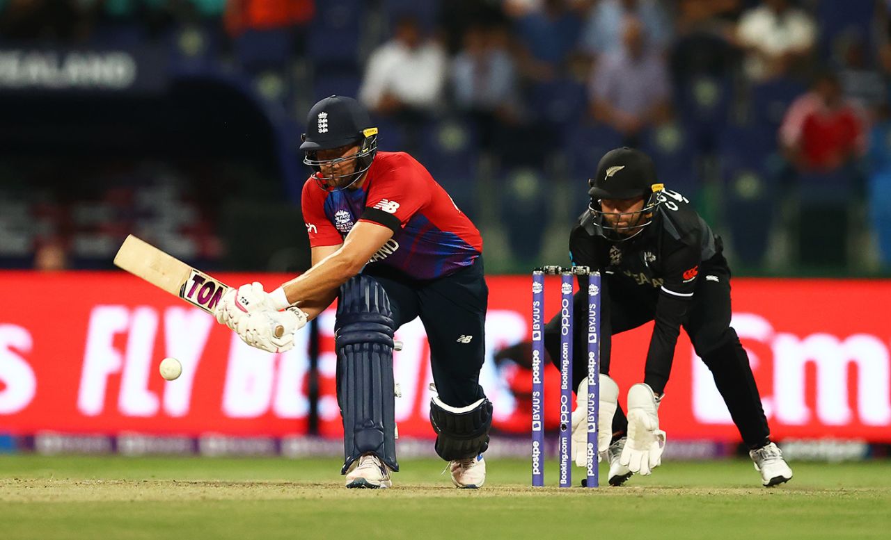 Dawid Malan looks to reverse-sweep while Devon Conway keeps an eye on the ball behind the stumps, England vs New Zealand, T20 World Cup, 1st semi-final, Abu Dhabi, November 10, 2021