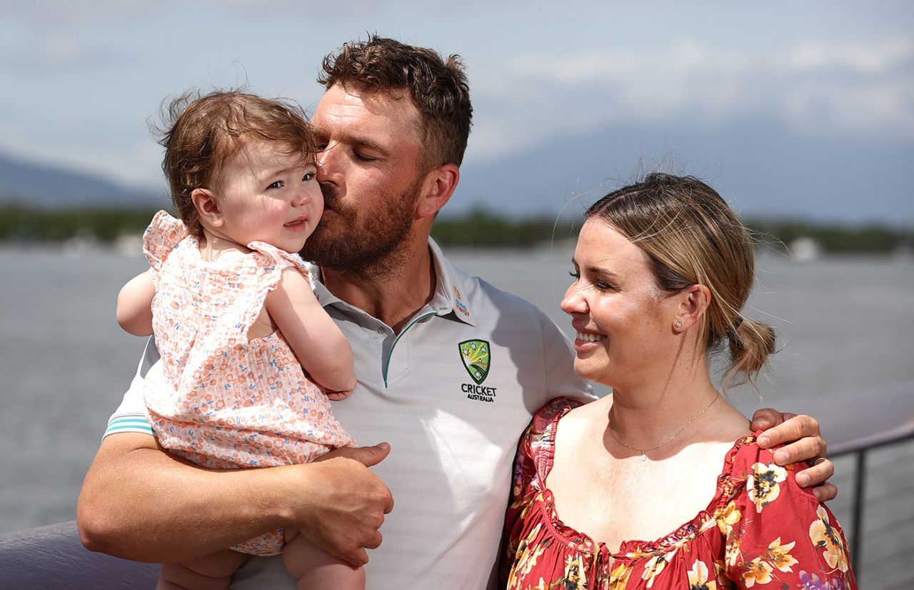 Aaron Finch with daughter Esther and wife Amy, Cairns, September 10, 2022