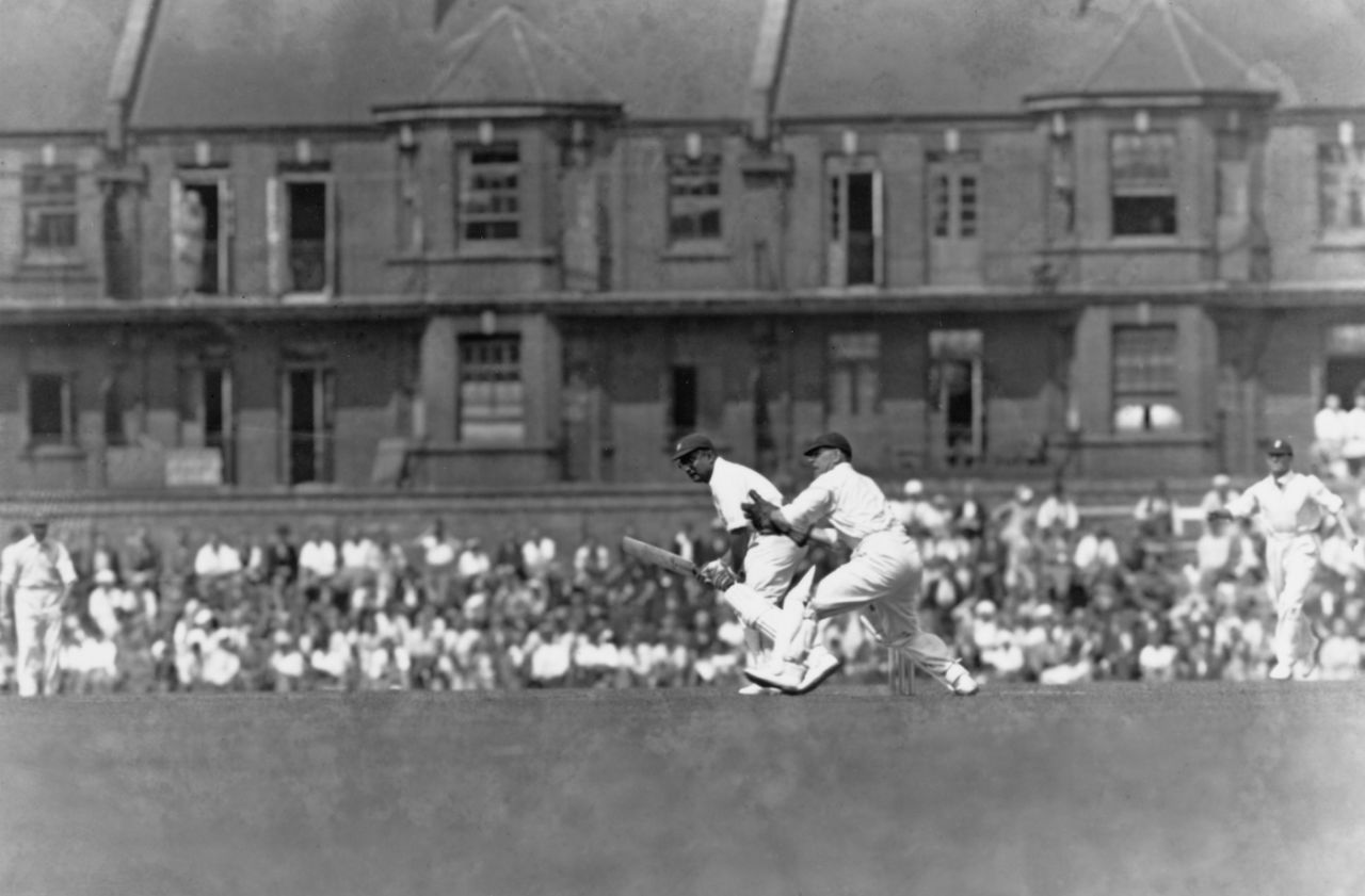 Wicketkeeper Edward Brooks looks on as the Maharajkumar of Vizianagram (right) plays a shot, Surrey vs Indians, Kennington Oval, June 20, 1936