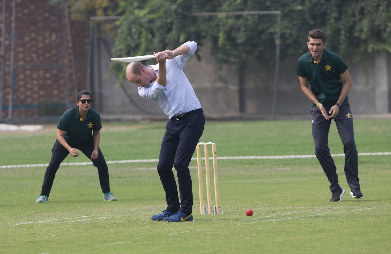Prince William plays cricket as Shaheen Afridi and Sana Mir look on, Lahore, October 17, 2019