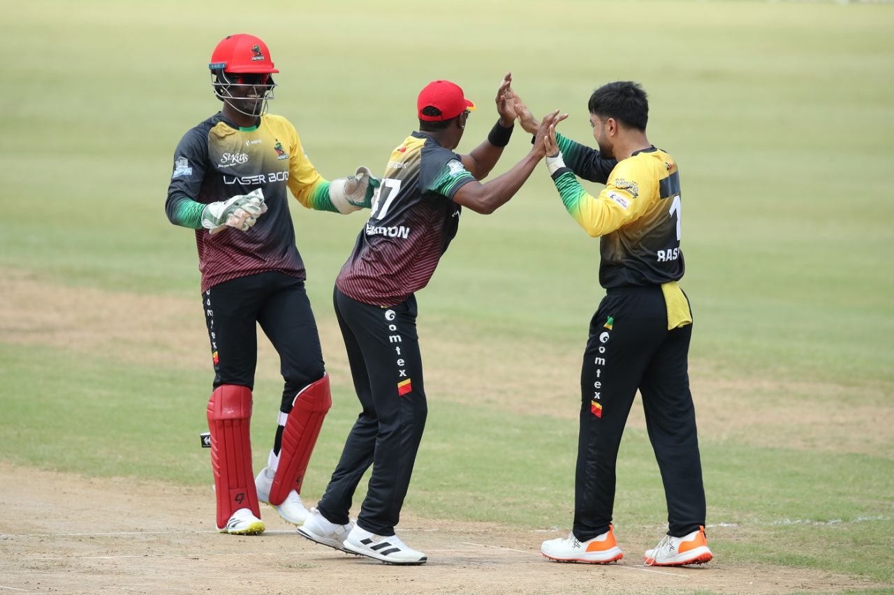 Rashid Khan celebrates a wicket with team-mates, Jamaica Tallawahs vs St Kitts and Nevis Patriots, CPL, Port of Spain, September 14, 2022