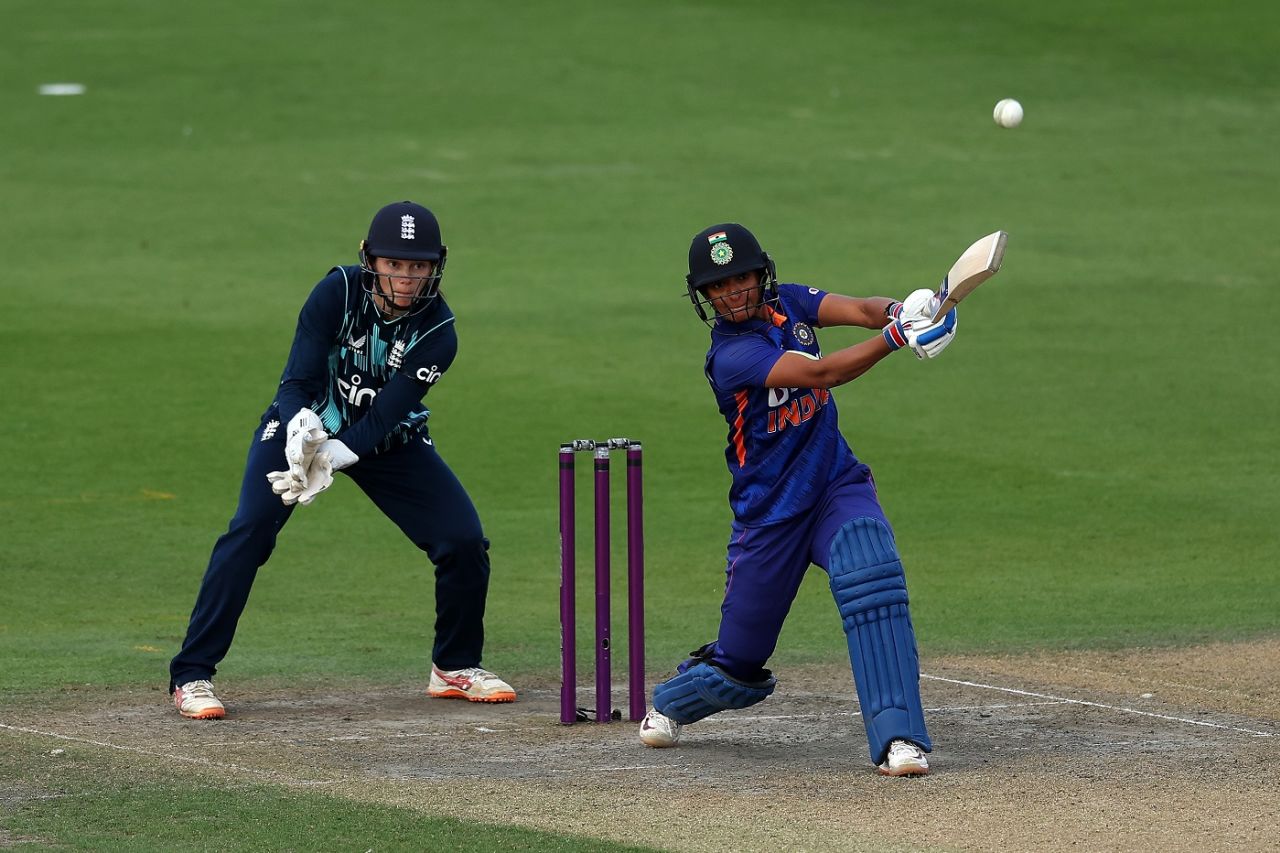Harmanpreet Kaur pounds one down the ground as Amy Jones looks on, England vs India, 1st ODI, Hove, September 18, 2022