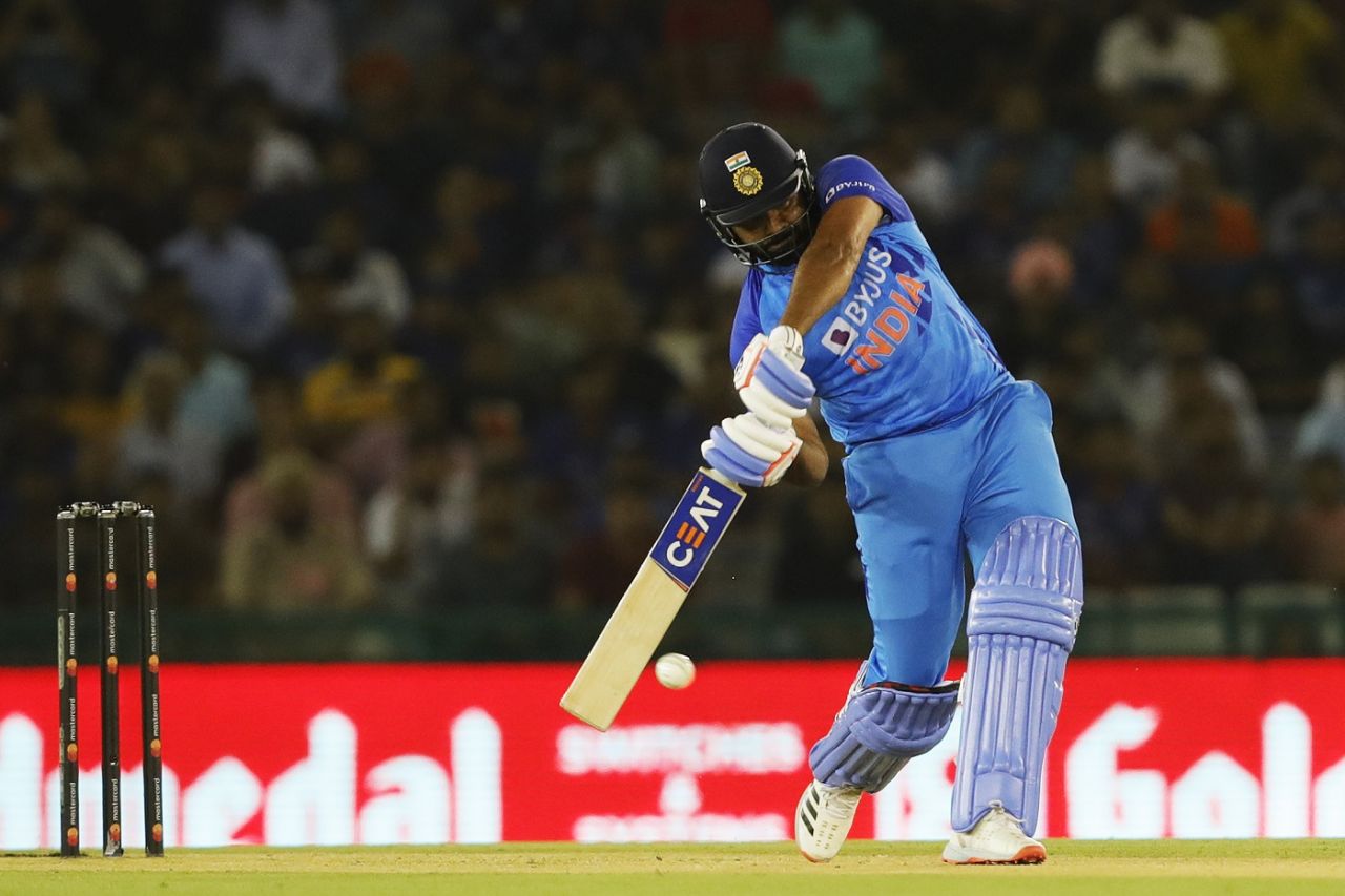 Rohit Sharma charges down to hit one over mid-off, India vs Australia, 1st T20I, Mohali, September 20, 2022