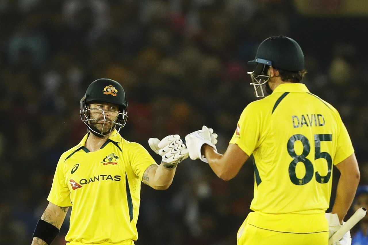 Matthew Wade and Tim David get in on the fist bumps, India vs Australia, 1st T20I, Mohali, September 20, 2022