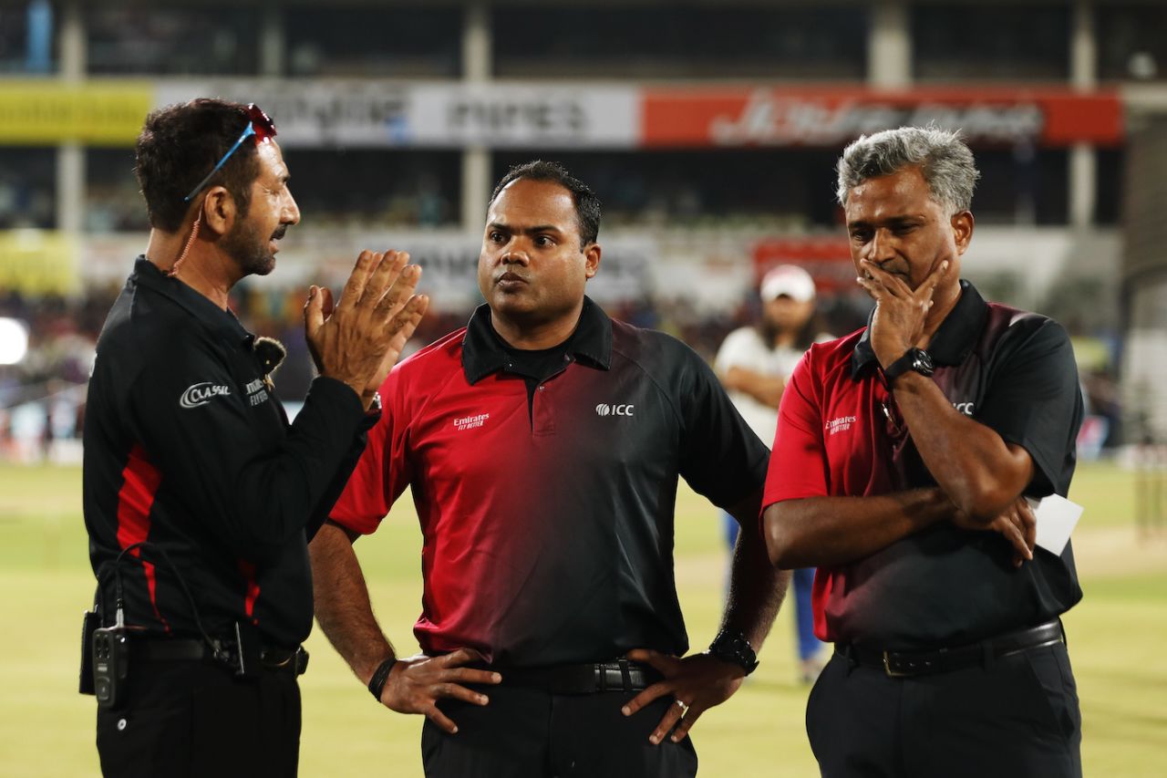 Umpires Anil Chaudhary (reserve), Nitin Menon and KN Ananthapadmanabhan don't look too happy with the sight around them, India vs Australia, 2nd T20I, Nagpur, September 23, 2022