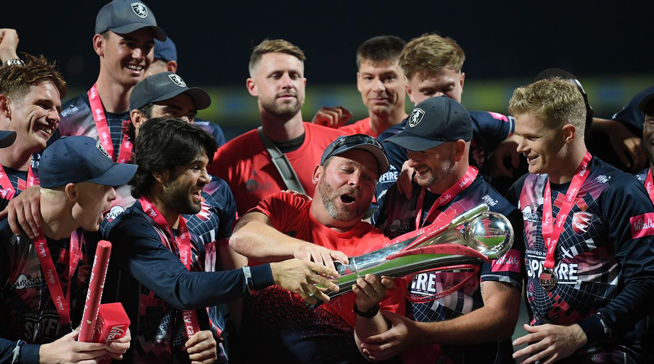 Kent captain Sam Billings (right) Darren Stevens (second from right) watch coach Max Walker hold the trophy, Somerset vs Kent, Final, Vitality T20 Blast Finals Day, Edgbaston, September 18, 2021