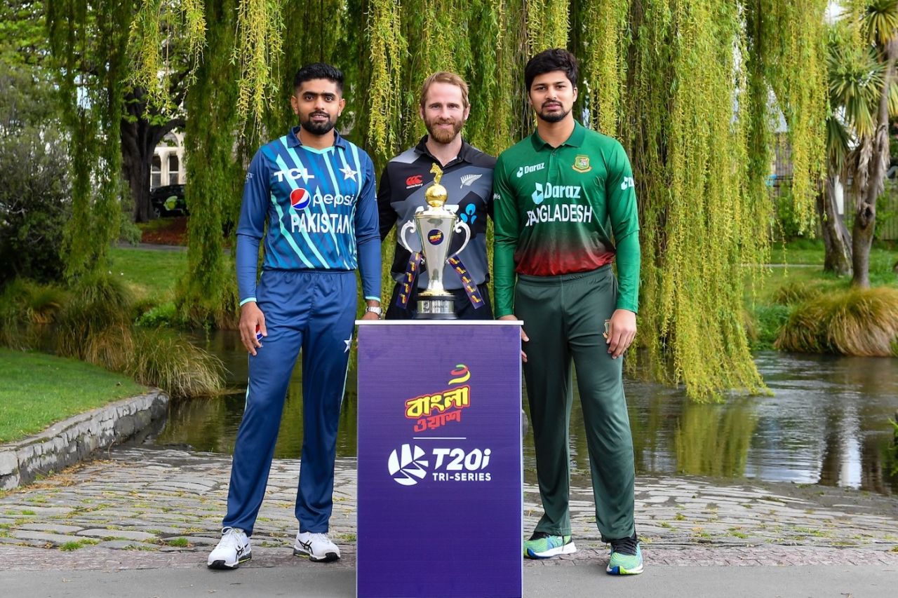 [L to R] Babar Azam, Kane Williamson and Nurul Hasan pose with the tri-series trophy, Christchurch, October 5, 2022