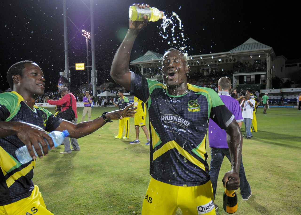 Rovman Powell pours a bottle of energy drink on himself after winning the CPL, CPL 2016, final, St Kitts, August 7, 2016
