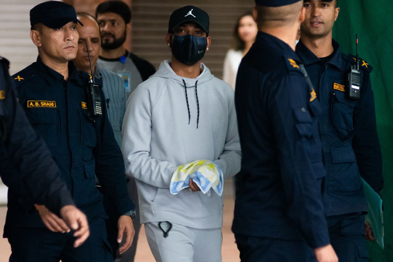 Sandeep Lamichhane taken into custody upon landing at Kathmandu airport, Kathmandu, October 6, 2022