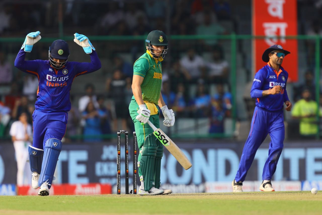 David Miller can't help but stare at the pitch, while Sanju Samson celebrates the former's wicket, India vs South Africa, 3rd ODI, Delhi, October 11, 2022