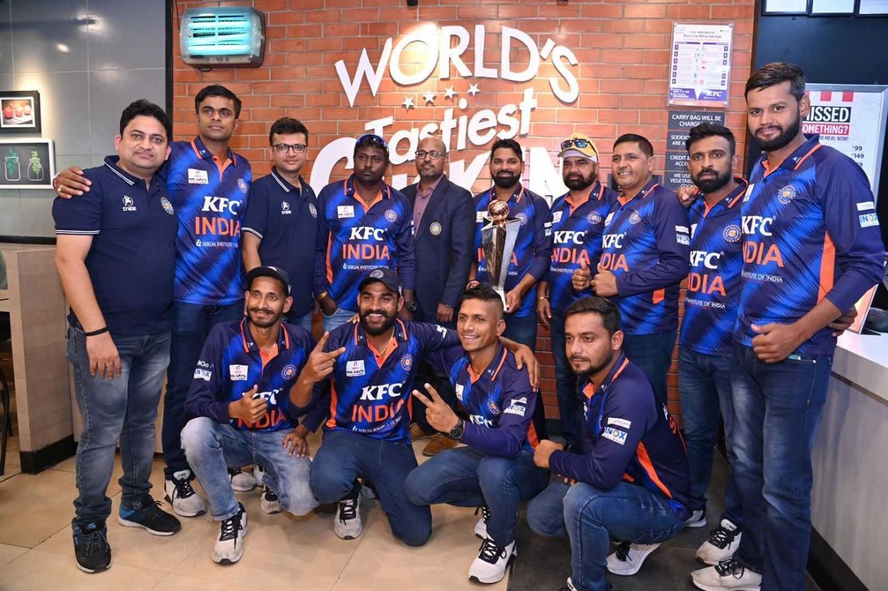 Members of the Indian deaf cricket team pose with the T20 Champions Trophy