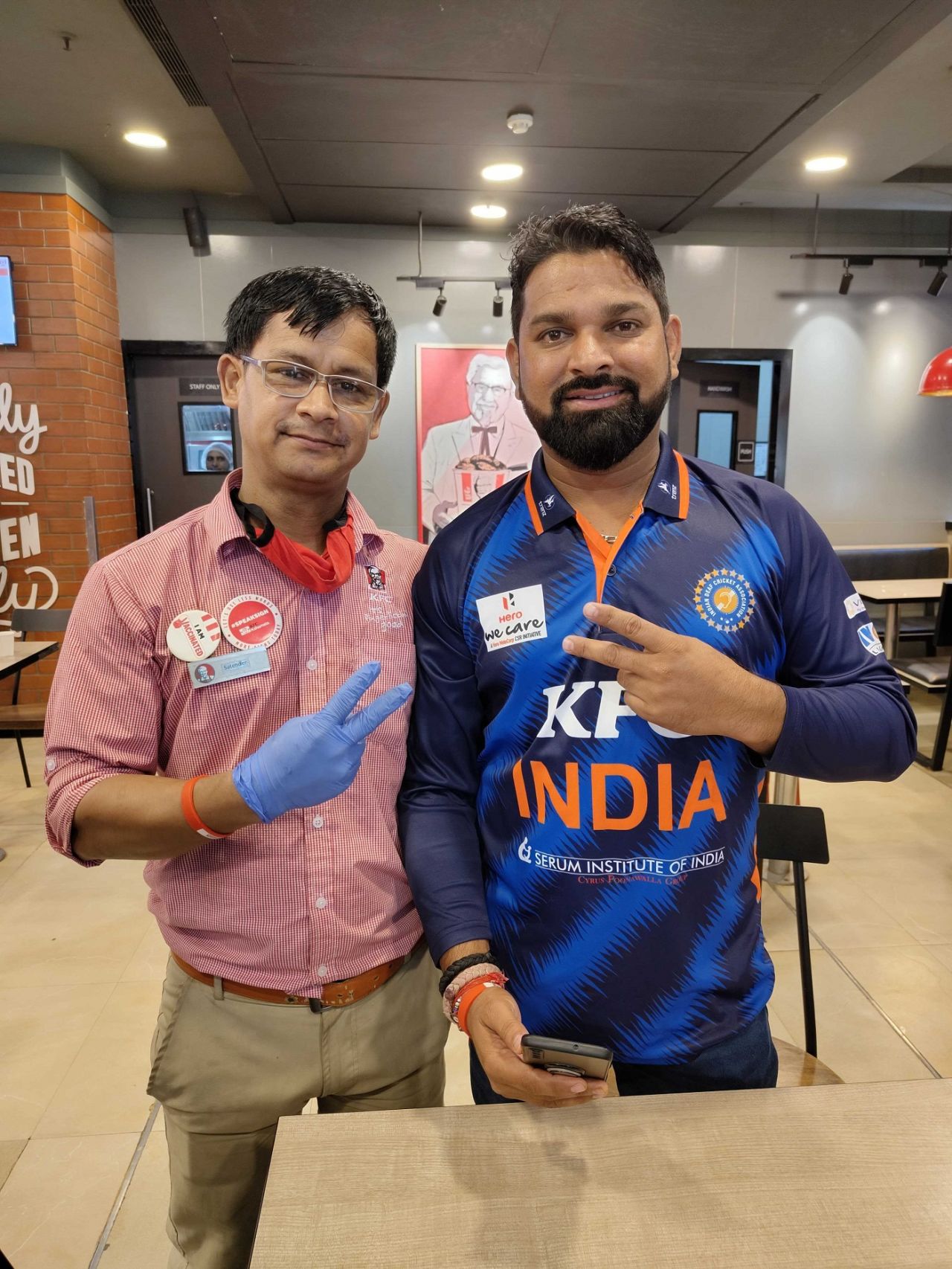 Indian deaf cricket team captain Virendra Singh (right) poses for a picture