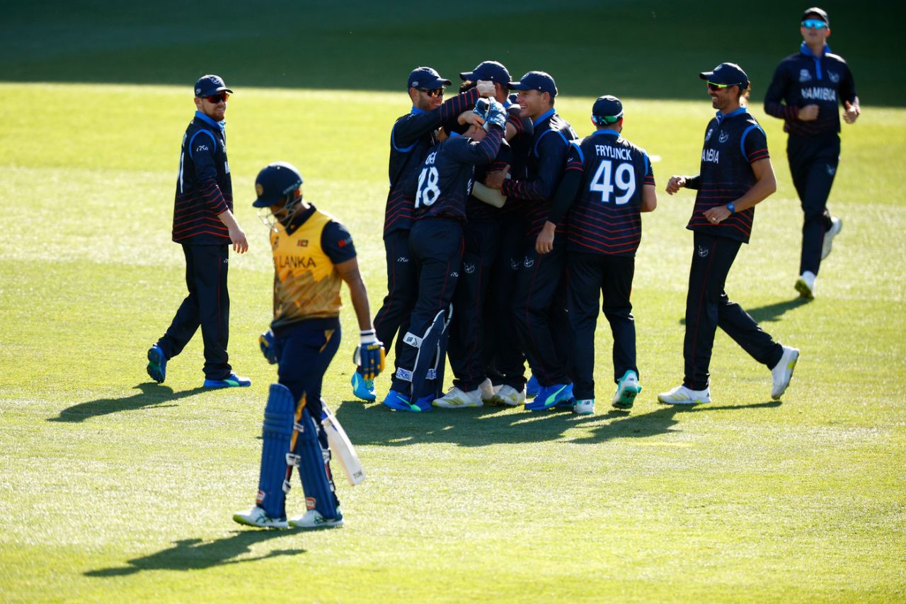 Ben Shikongo is mobbed by team-mates after claiming Danushka Gunathilaka for a golden duck, Men's T20 World Cup 2022, 1st Round, Group A, Geelong, October 16, 2022