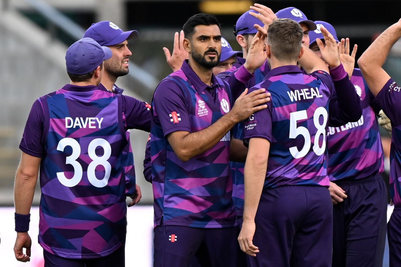 Saafyan Sharif and Brad Wheal celebrate dismissing Evin Lewis, West Indies vs Scotland, Men's T20 World Cup 2022, First round Group B, Hobart, October 17, 2022