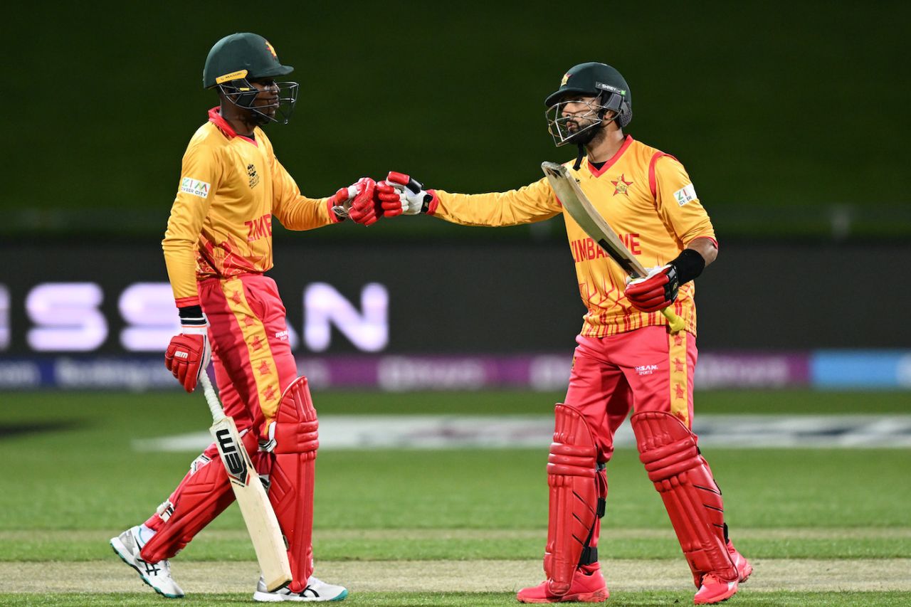 Sikandar Raza is congratulated by Milton Shumba upon completing a half-century, Ireland vs Zimbabwe, ICC Men's T20 World Cup, Hobart, October 17, 2022 