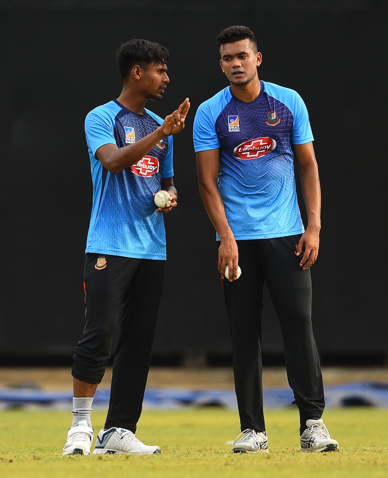 Mustafizur Rahman and Taskin Ahmed have a chat during training, Colombo, July 25, 2019