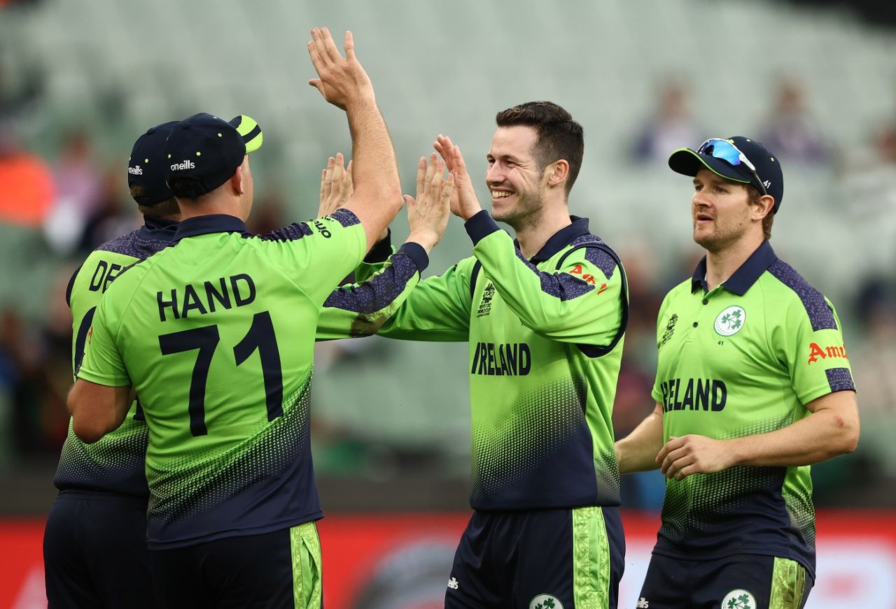 George Dockrell celebrates with team-mates the dismissal of Harry Brook, England vs Ireland, ICC Men's T20 World Cup 2022, Melbourne, October 26, 2022