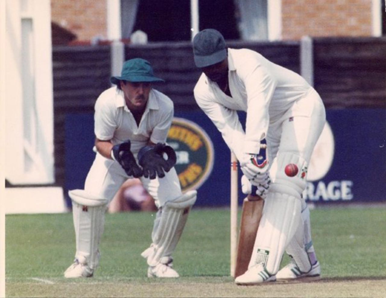 St Annes keeper John Isles watches Malcolm Marshall defend a ball from Stuart MacGill, 1994